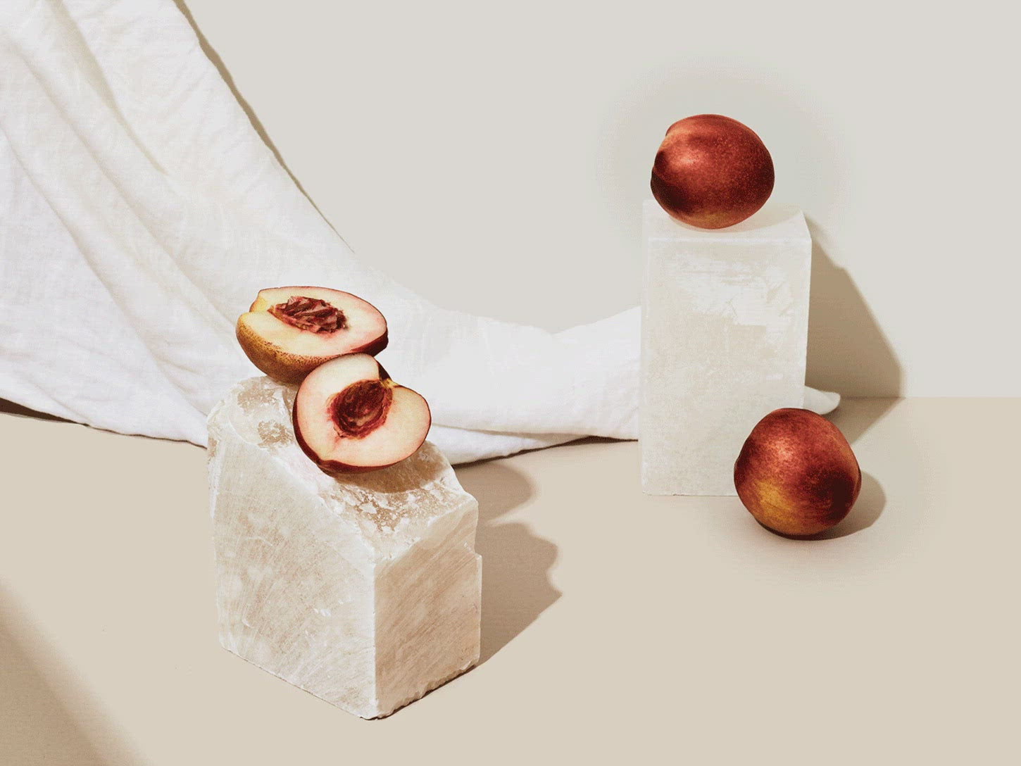 moving image of peaches on rocks